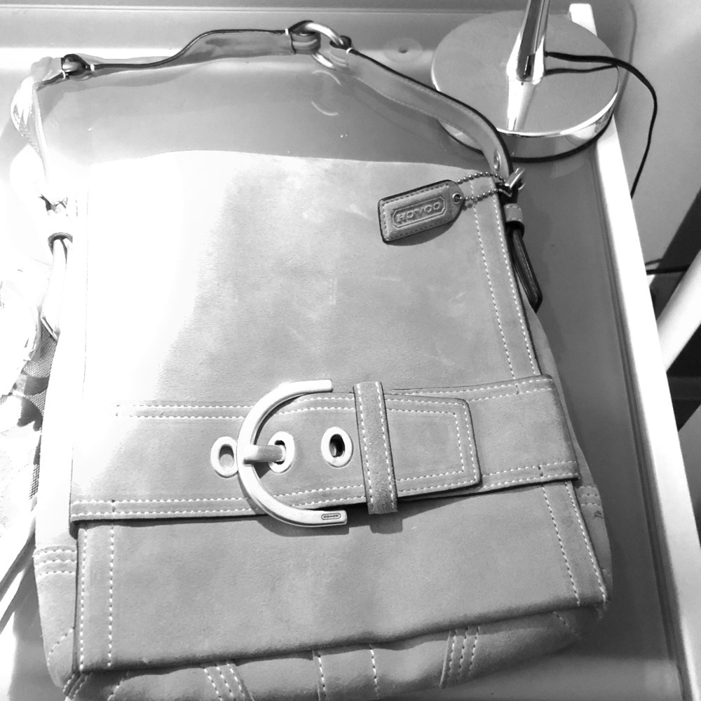 Salmon colored suede shoulder bag